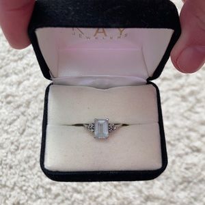 Kay jewelers 10k emerald cut aquamarine ring. Size might be around a 6.